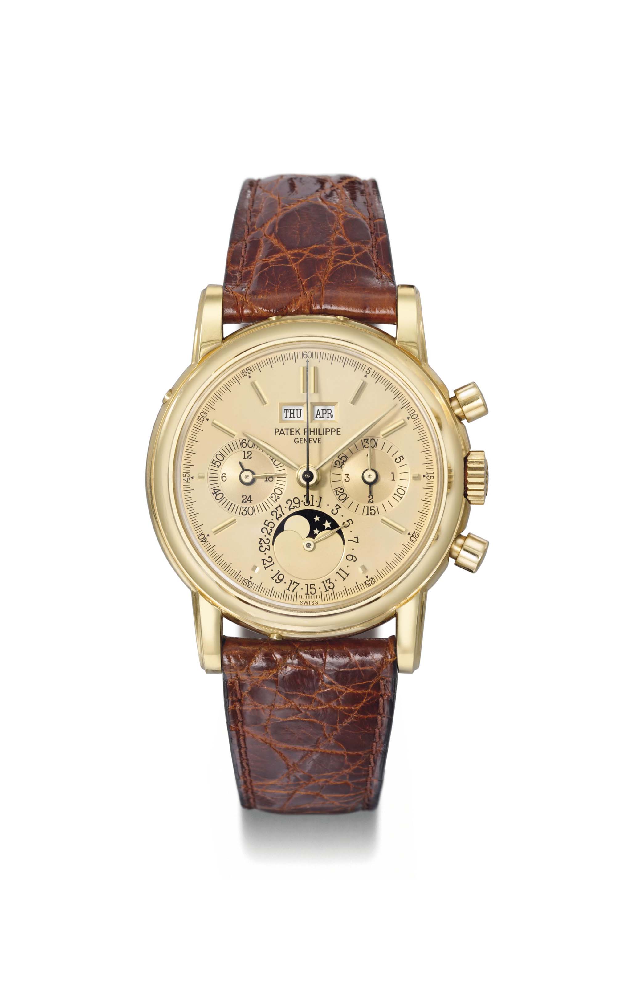 Patek Philippe. A very fine and very rare 18K gold perpetual calendar  chronograph wristwatch with moon phases and original certificate
