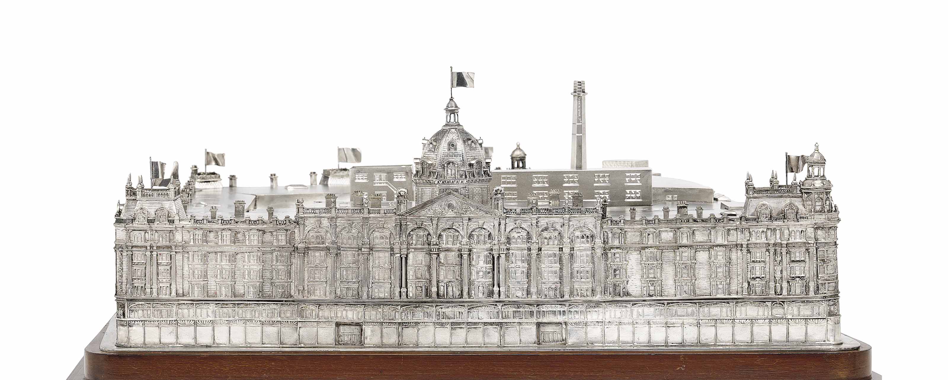 selfridges cigarettes THE HARRODS-SELFRIDGE WAGER PRIZE A GEORGE V SILVER CIGAR BOX IN THE FORM  OF AN ARCHITECTURAL MODEL OF HARRODS DEPARTMENT STORE, MARK OF RICHARD  WOODMAN BURBIDGE FOR HARRODS LTD., LONDON, 1927 |