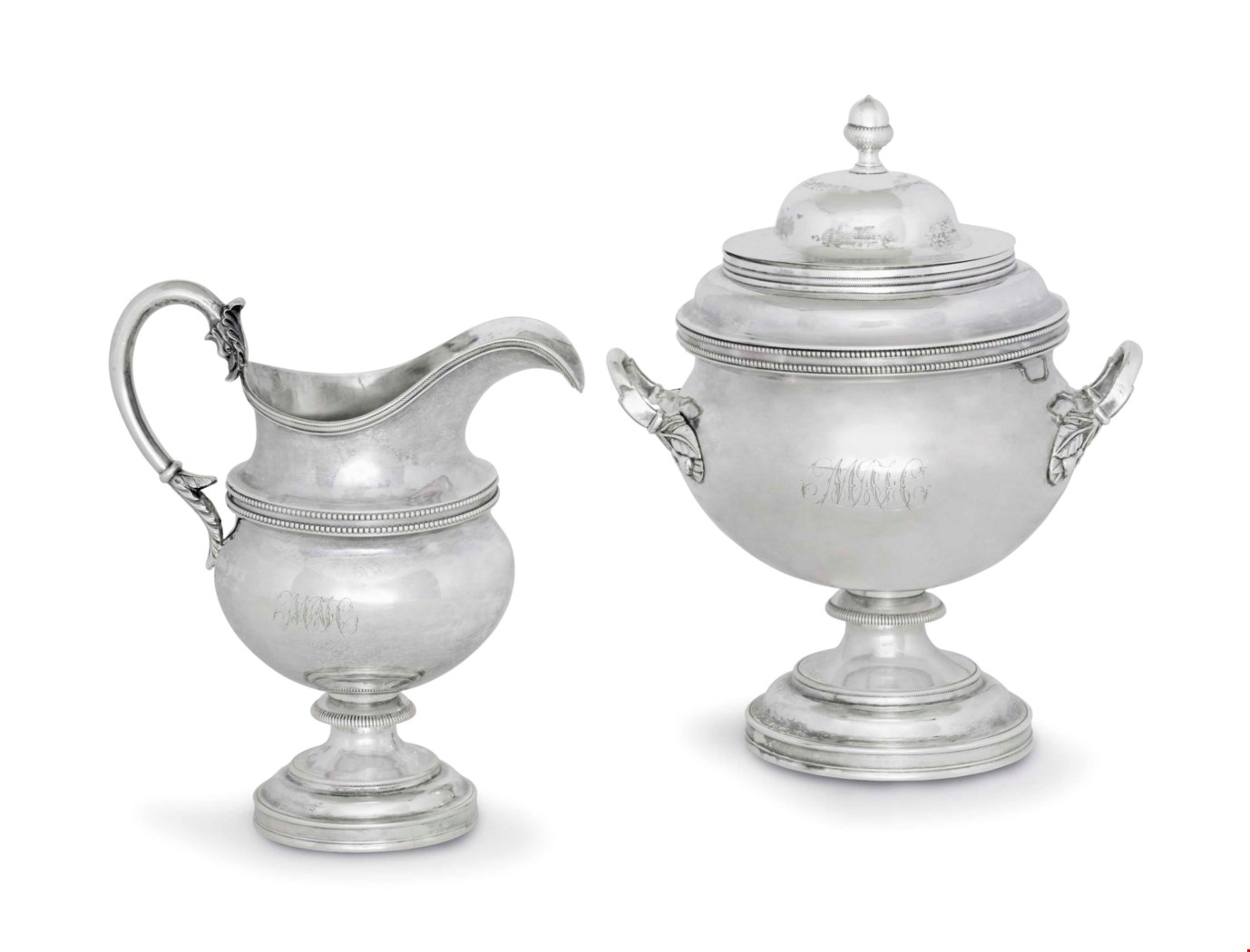 AN EARLY SILVER MILK JUG AND A TWOHANDLED SUGAR BOWL AND COVER, MARK