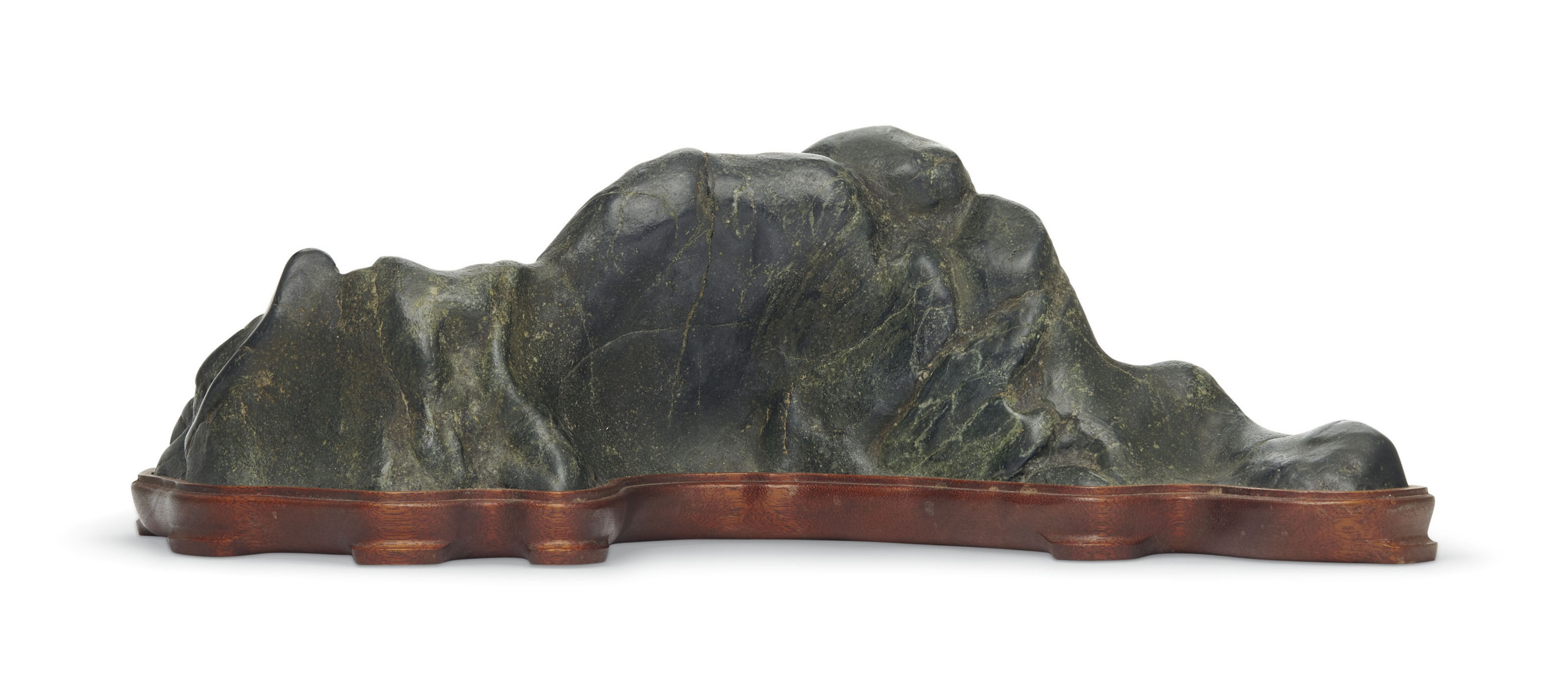 A RARE HUANGHUALI AND HUAMU ROUND-CORNER TAPERED CABINET