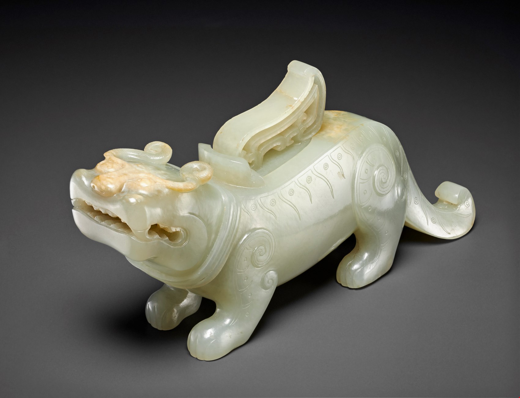 a-pale-greyish-white-jade-feline-form-vessel-and-cover-qing-dynasty