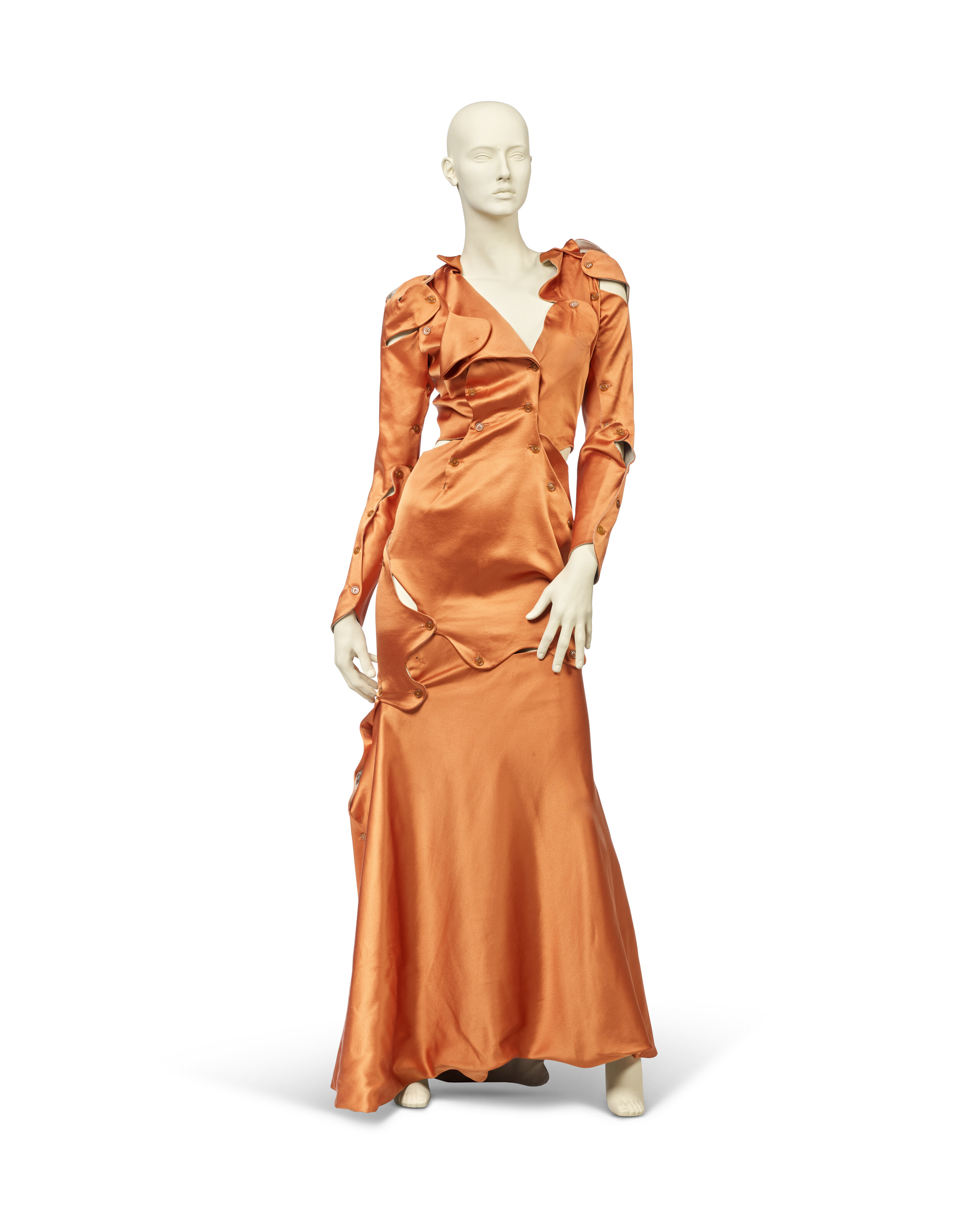 VIVIENNE WESTWOOD, 'WAKE UP CAVE GIRL' COLLECTION, AUTUMN-WINTER 2007 / 08,  AN ORANGE SATIN 'FLINTSTONE' DRESS AND CAPE | Christie's