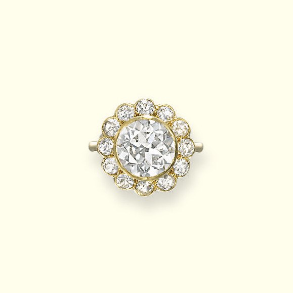 A DIAMOND CLUSTER RING, BY GARRARD & CO